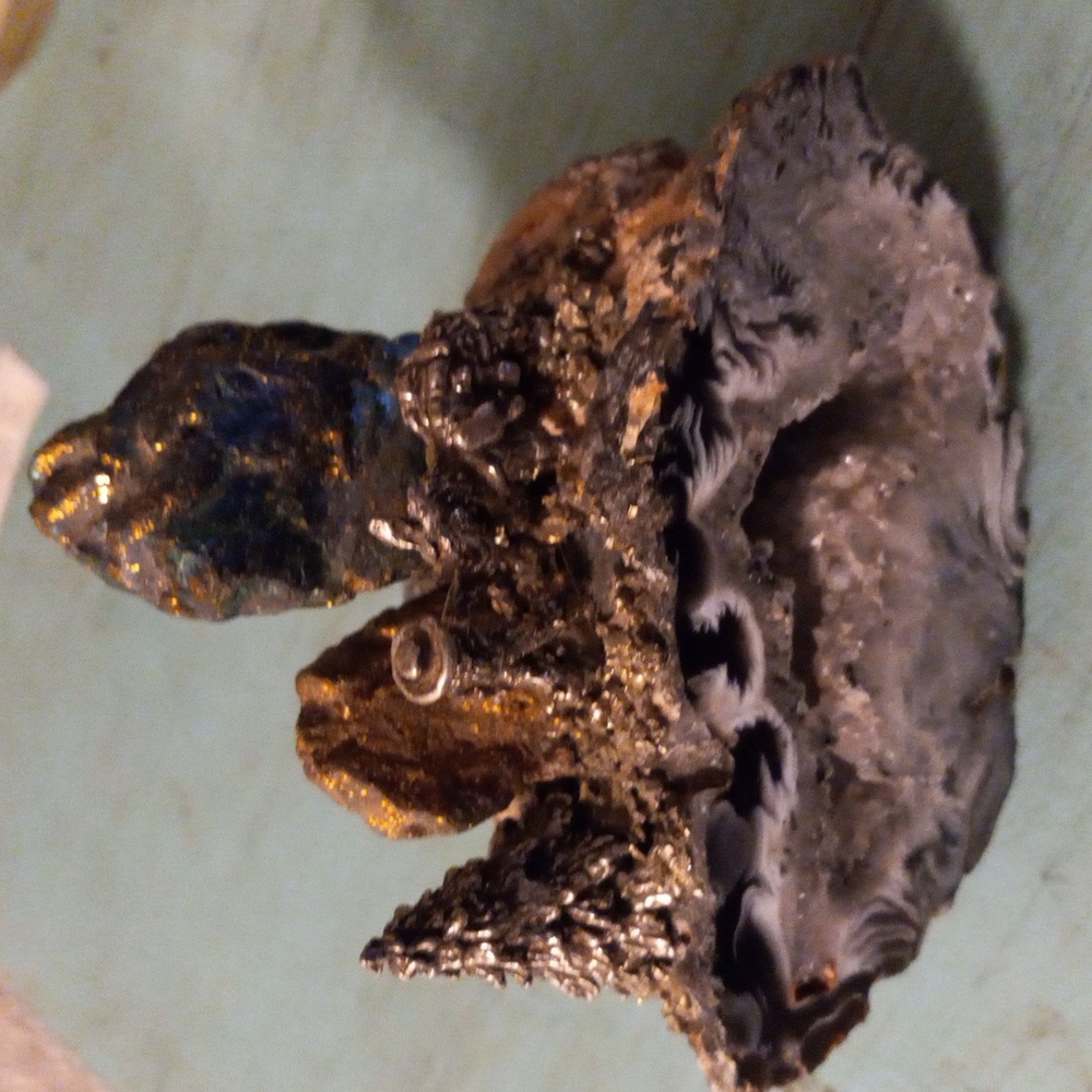 Natural geode miner sculpture